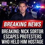 <p>BREAKING: Nick Sortor says protesters vandalized his car, held him hostage — he escaped.
(<a href="https://archive.ph/2026.01.08-121319/https%3A/x.com/nicksortor/status/2009152989504606430?utm_source=openai">archive.ph</a>)</p>